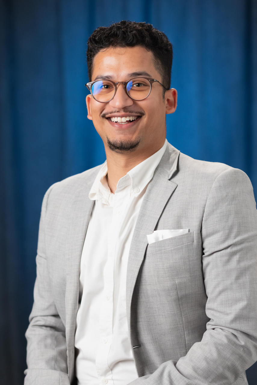 Ali Akbar Hasani smiling